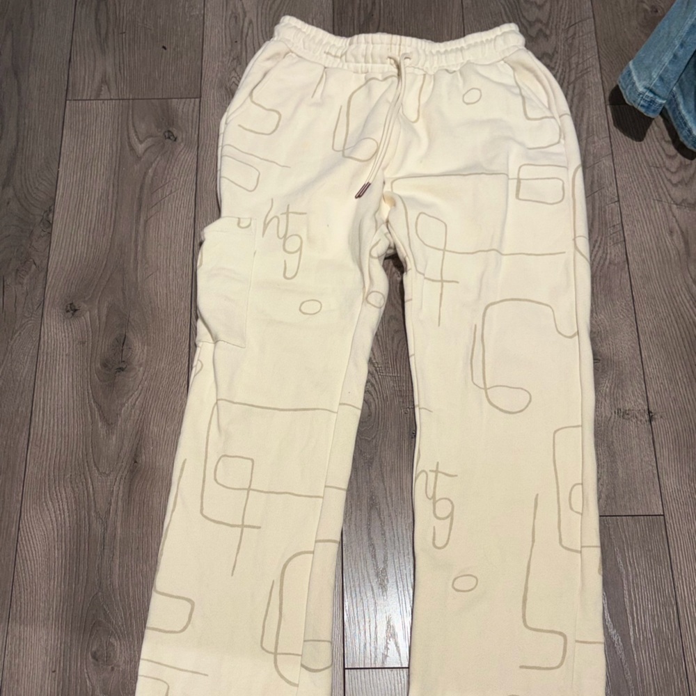 Cream Sweatpants with Abstract Design